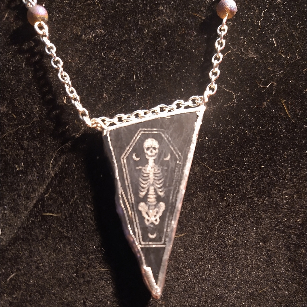 Natural black marble skeleton coffin necklace